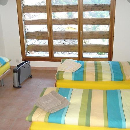 Apartmán Rustico Pacifico Brontallo Pokoj fotografie