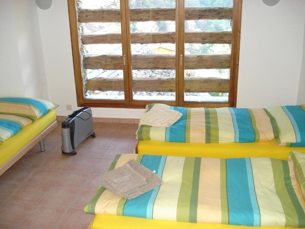 Apartmán Rustico Pacifico Brontallo Pokoj fotografie